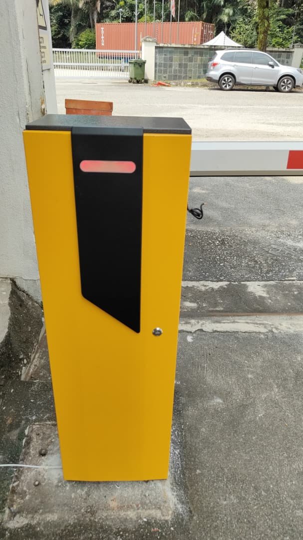 Barrier gate housing in brand yellow