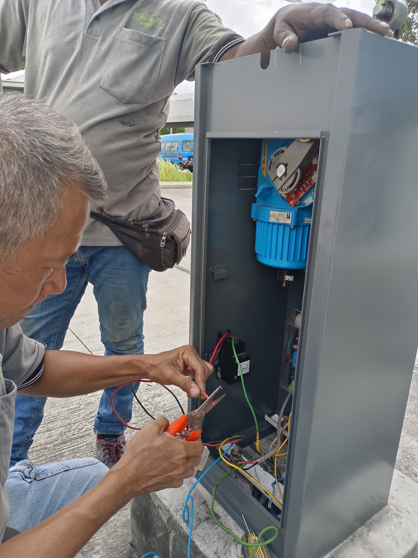 Yong & Co technician servicing a barrier gate